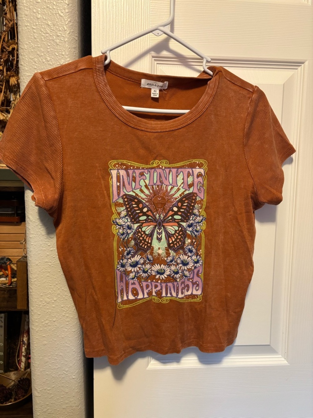 Vintage-Inspired Rust Graphic Tee with Butterfly Print